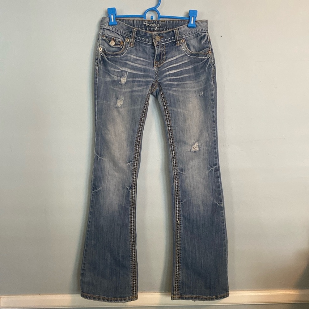 Low rise Amethyst embroidered jeans, tan and white seam, distressed.